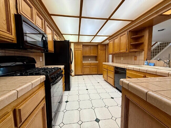 "Spacious 4-Bedroom Gem with 3 Full Baths in Cypress!"