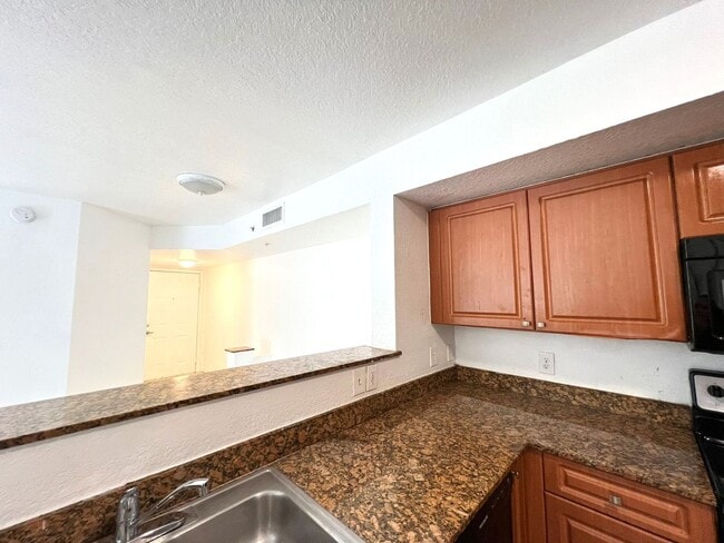 Photo - Welcome to Your Ideal Home in North Miami's Gated Community