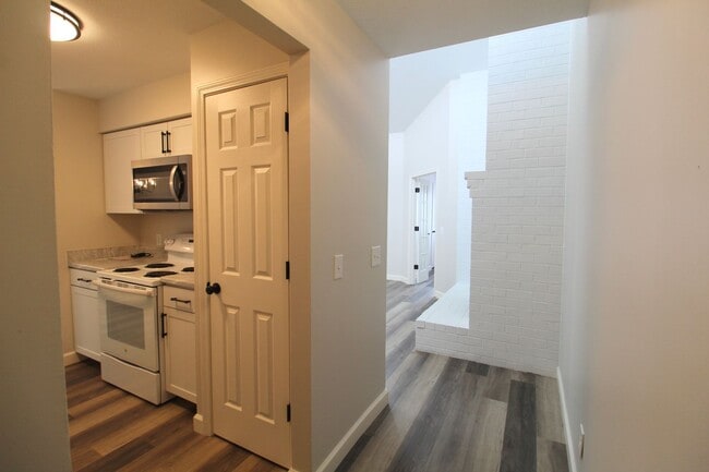 Photo - Fun and Stylish Living at Madison Manor! Top-Floor Condo with Vaulted Ceilings and Skylights