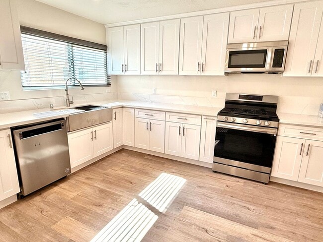 Photo - Beautifully Updated 3-Bedroom Tri-Level Co...
