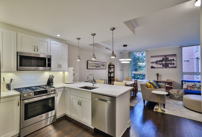 Building Photo - Pets Welcome!! Private Garage Parking Avai... Unit #409 Rental