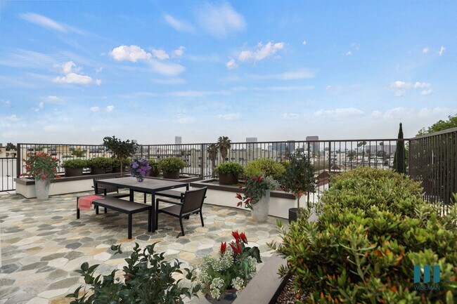 Terraza en la azotea con zona de estar