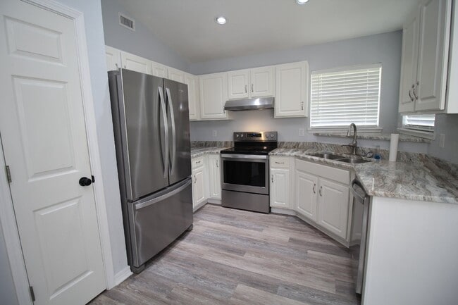 Photo - Updated Fox Hollow 3BR Home Near 9 Mile Rd with LVP Flooring, Granite Kitchen, 2-Car Garage & Fen...