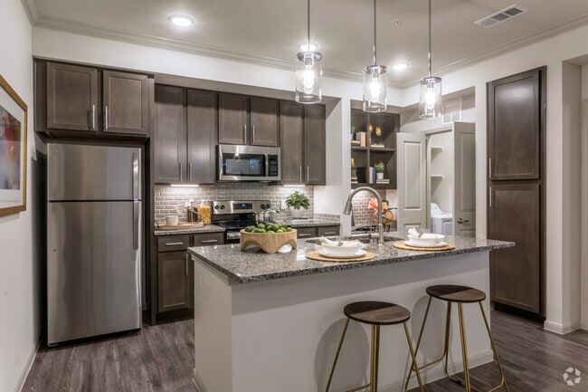 Kitchen, Built-In Desk, and Laundry Room