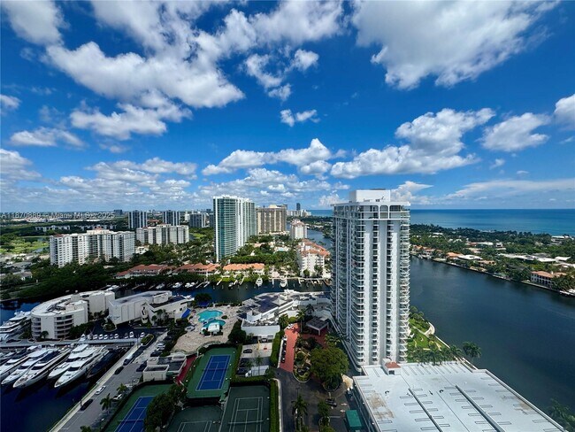 Building Photo - 19667 Turnberry Way Unit Tw E Rental