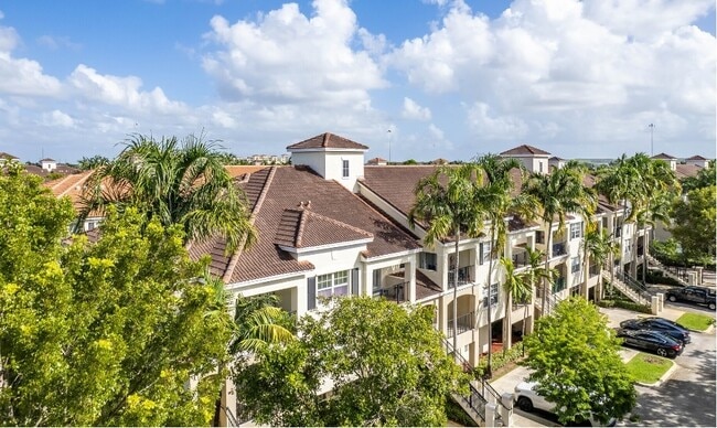 Poinciana Place - 5840 W Sample Rd Unit 102