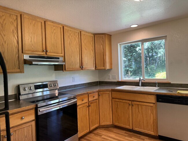 Photo - Lovely one story home 4 bedrooms plus guest space and bonus room!