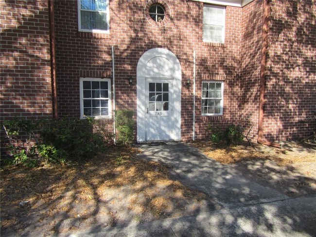 Building Photo - 1143 85th Terrace N Unit C