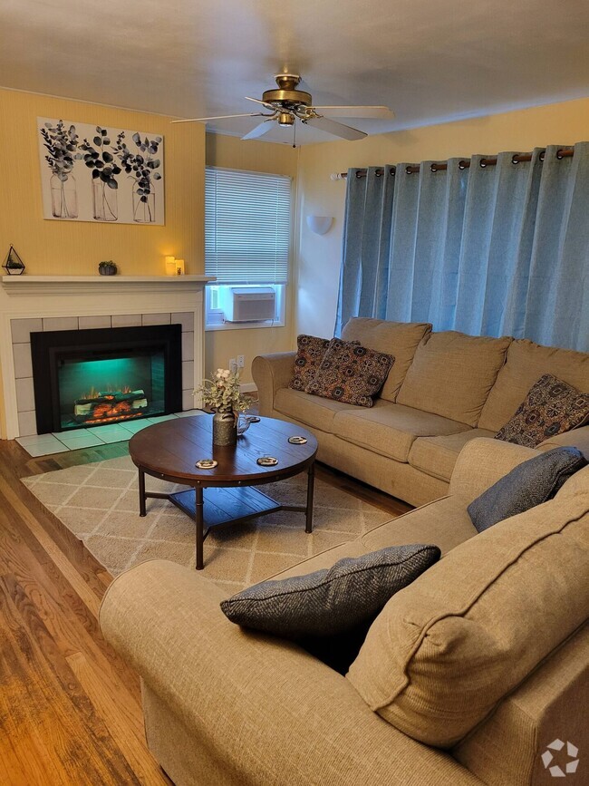 Living room with electric fireplace - 2313 A St Rental