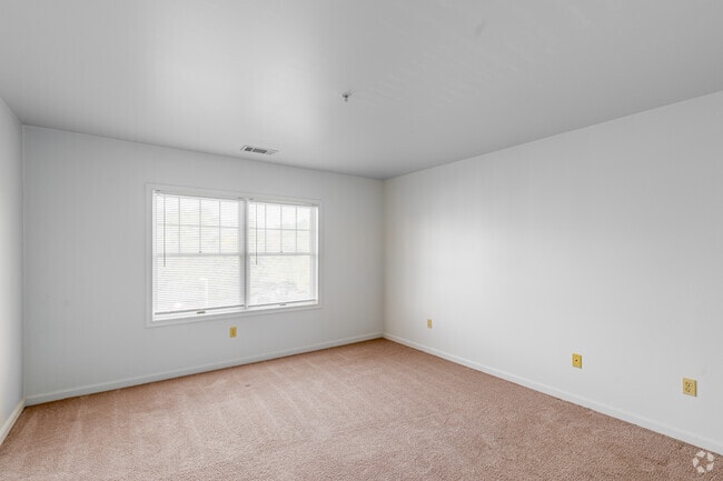 2BR, 2BA - 1,210SF - Primary Bedroom - Silver Mill Apartments