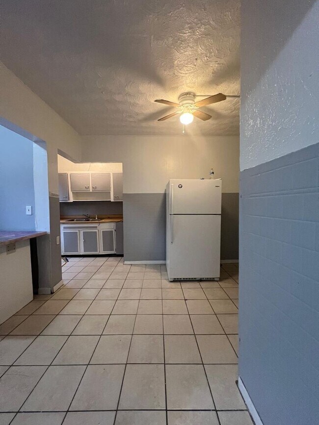 Photo - 1563 E 47th St Unit 1 down