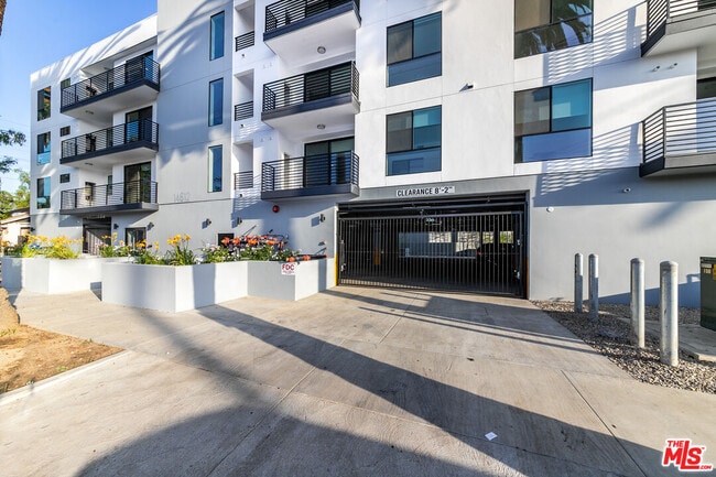 Building Photo - 14612 Calvert St Unit 402 Rental
