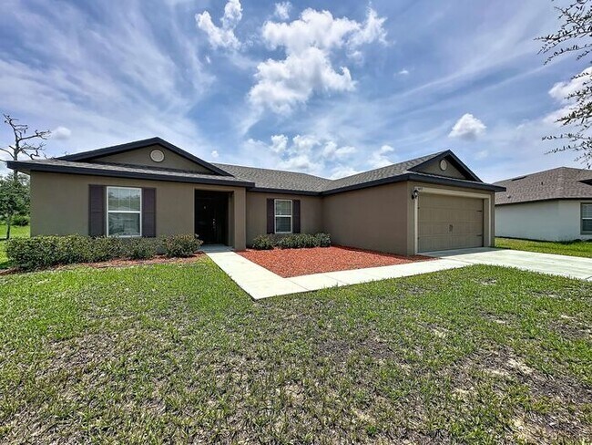 Photo - Spacious Open-Concept Living with Modern Finishes in Villate 7 Poinciana