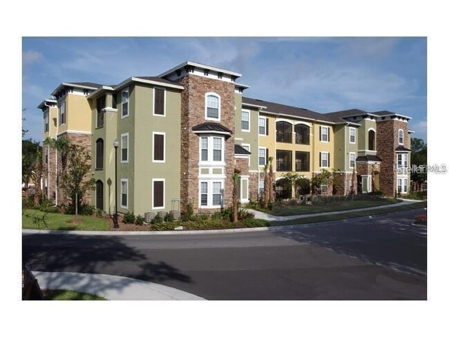 Building Photo - 10201 Courtney Palms Blvd Unit 302