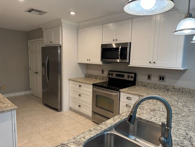 Photo - COMING SOON!! Highly Desirable DR PHILLIPS 3 bedroom 2 bath townhome with double car garage