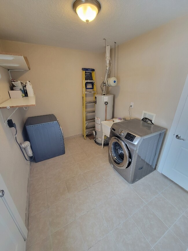 Laundry room with included washer/dryer for your use - 1170 Racine Street Unit Whole House