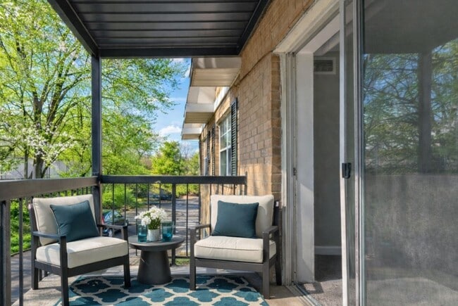 Unwind in the serene atmosphere of Parkside Apartments. This inviting balcony space offers the perfect retreat with stylish seating and beautiful views. Elevate your living experience today—schedule a visit to see it for yourself!