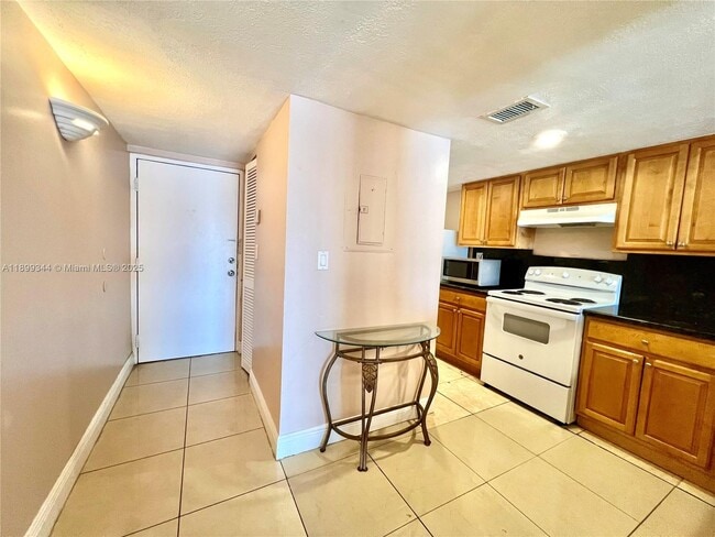 Photo - 9915 W Okeechobee Rd Unit 2-506