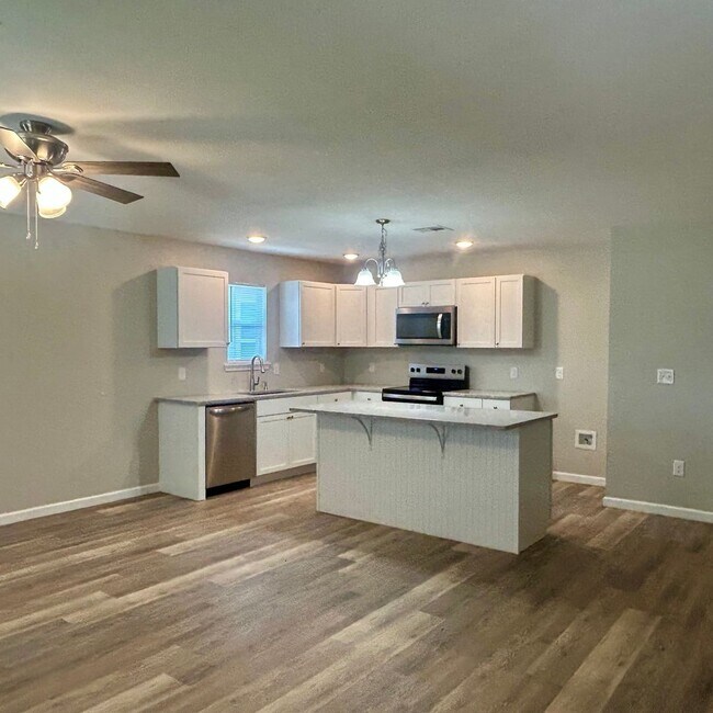Photo - Welcome home to this beautifully designed 3-bedroom, 2 bath half duplex