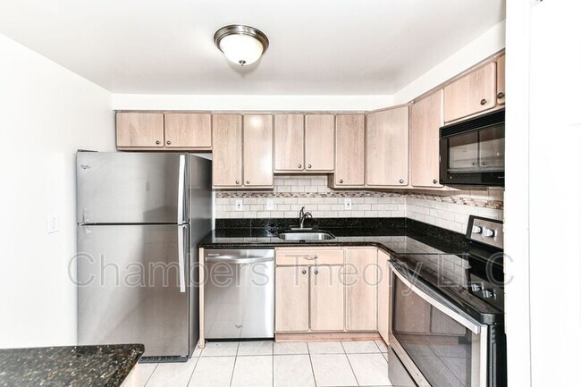Building Photo - 7621 Tremayne Pl Unit #102 Rental