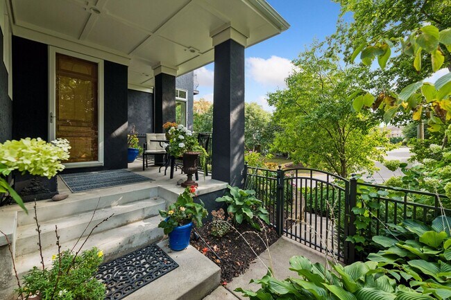 Lovely front porch area to greet guests or unwind