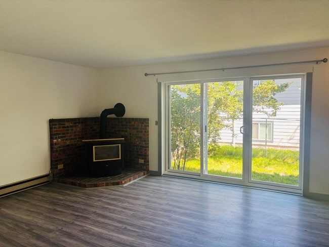 Building Photo - Renovated 3BR condo w/ garage & private yard **MOVE IN SPECIAL - $100 off each month**