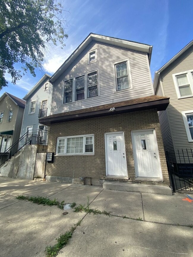 Building Photo - 4812 S Elizabeth St Unit 2R