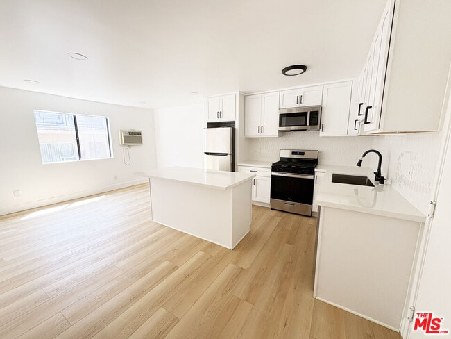 Building Photo - 5440 Carlton Way Unit 106 Rental
