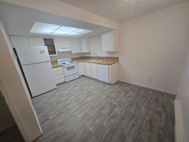 Photo - 2 Bed - 1 Bath Unit with Covered Parking Unit 1030