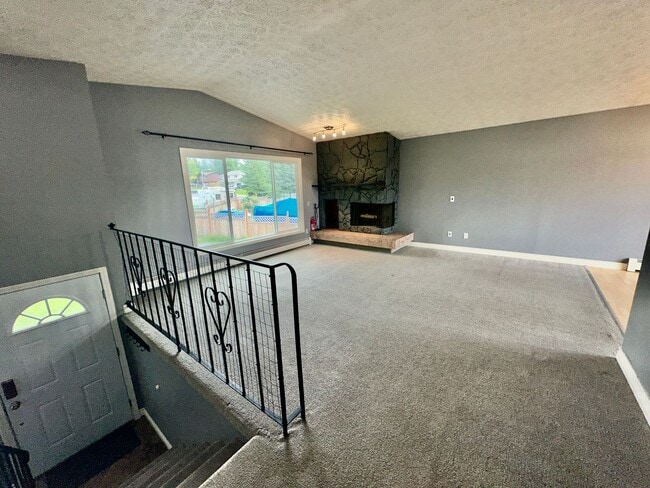 Photo - HUGE BACKYARD, 4 BED 2 BATH, HEATED GARAGE HOME!