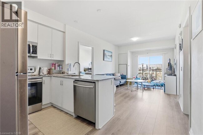 Photo - 128 Grovewood Common Unité 304