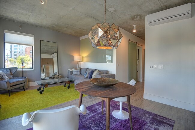 Luxe living room and dining area with plenty of natural light