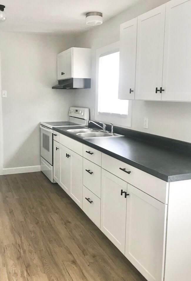 Kitchen -- Note, the stove is across from where it is from in the current unit for rent - 217 Lane St Apartamentos Unidad 217 1/2