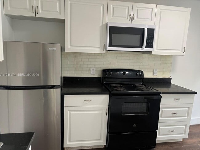 Building Photo - 2118 N 19th Ave Unit 1-4 -R