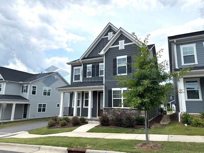 Photo - Spacious Corner-Lot Home with Guest Suite, Screened Porch & Detached 2-Car Garage – Resort-Style ...
