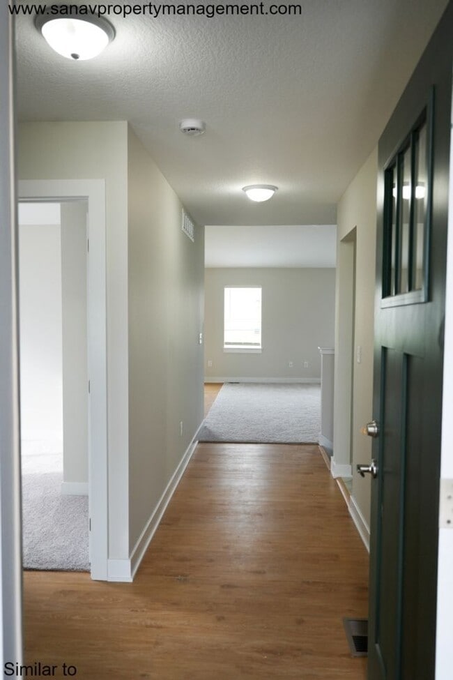Photo - "Modern Comfort & Convenience: 3 Bed, 2 Bath Ranch Style Home in Waukee's Prime Location"