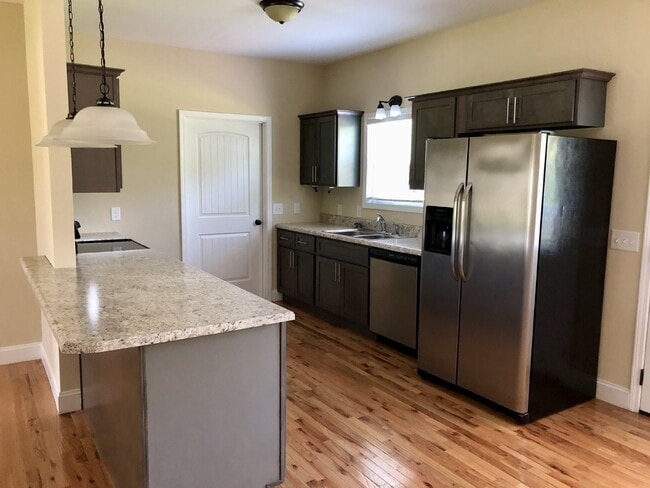 Photo - " 3-Bed 2 bath Oasis with Granite Elegance & Gleaming Hardwood in Cookeville!"