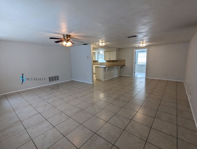 Photo - Fresh paint throughout this 3/2/1 1400 Sq....