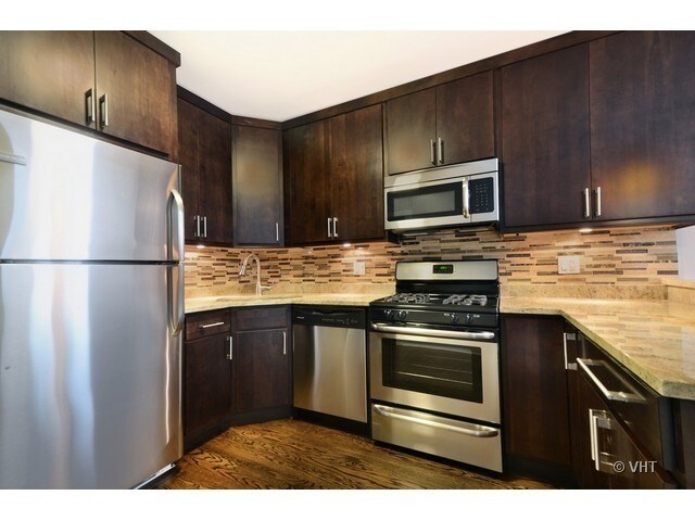 kitchens w/ mocha cabinetry, granite counters - 4573 N Elston Ave Unit 1