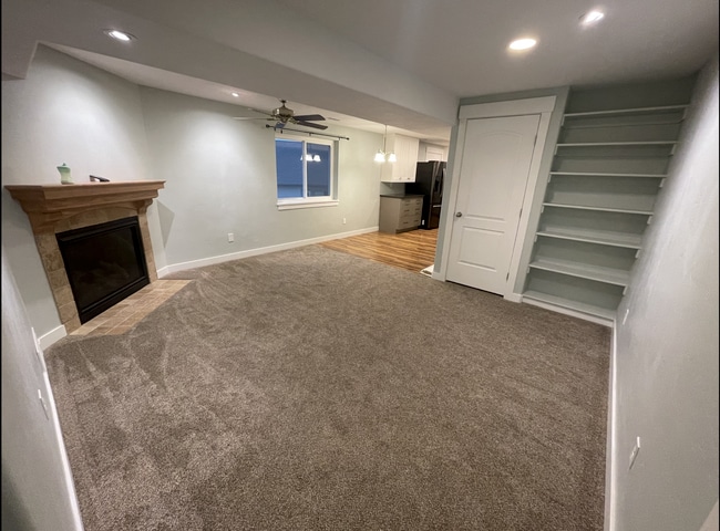 Family room - 3892 E South Pass Cv Unit Apt. A