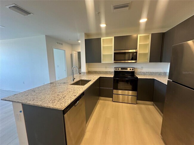 Photo - 5587 Millenia Blvd Unit 504