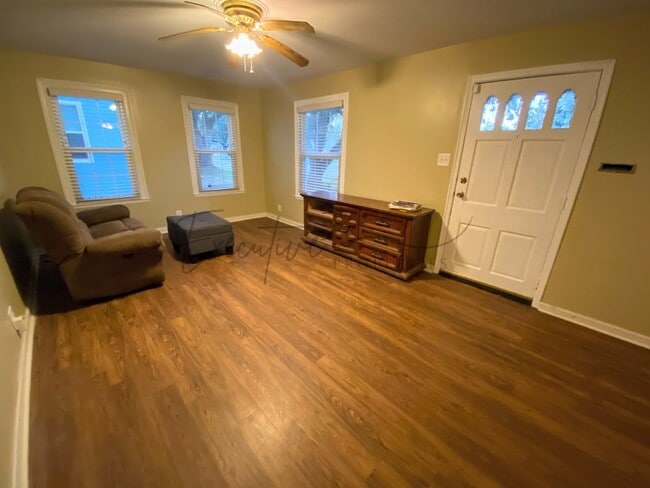 Photo - Well-Kept 3BR Home with Sunroom, Garage & Fenced Yard