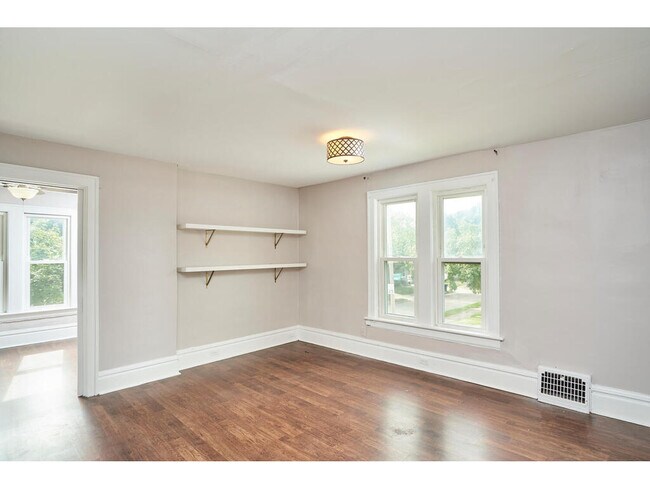 Living Room with built-in shelves - nice and bright! - 1214 Beardsley St Unit B