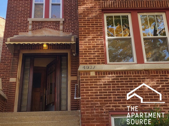 Building Photo - 4039 N Long Ave Unit 1