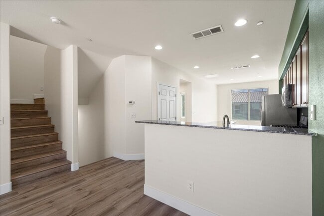 Photo - Modern 4-Bedroom Retreat with Dual Primaries, Loft, Balcony & Community Pool in North Las Vegas