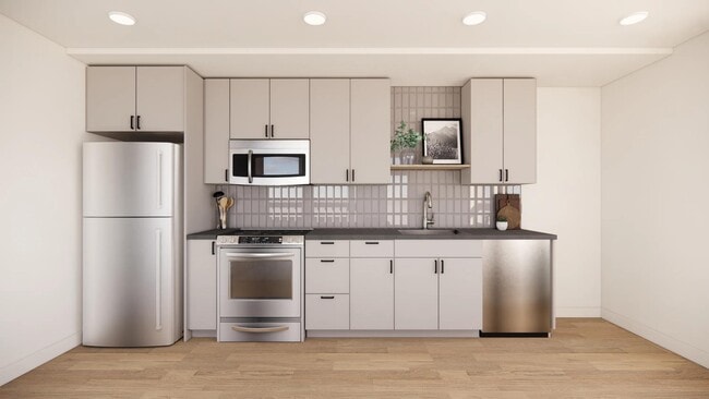 Elevate your culinary experience with sleek quartz countertops, soft-close cabinets, and ambient under-cabinet lighting. - Modera Bridle Trails