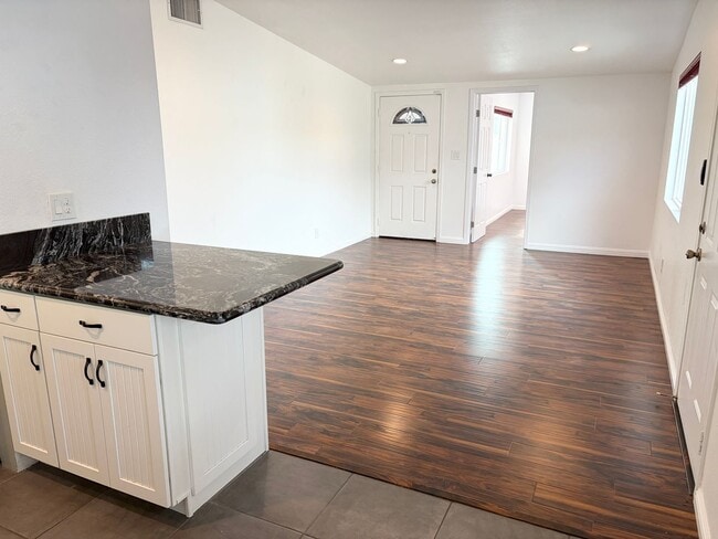 Photo - Beautifully Maintained 4-Bedroom Home with Private Backyard