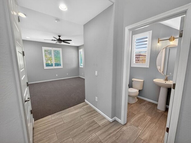 Photo - Stunning 5 Bed/5Bath Home in Gated Community – Over 3,100 SqFt of Modern Living -New Carpet throu...