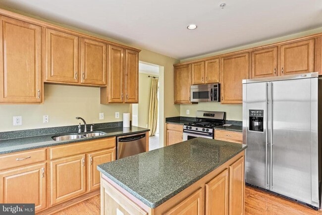 Building Photo - 6000 Same Voyage Way Unit 405