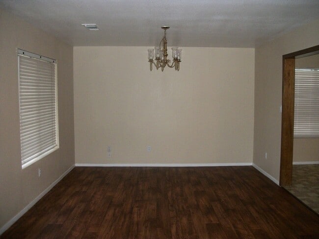 Photo - Coming Soon: Spacious Renovated 3 Bedroom Rosedale Home with Pool, Dual Fireplaces & Covered Patio